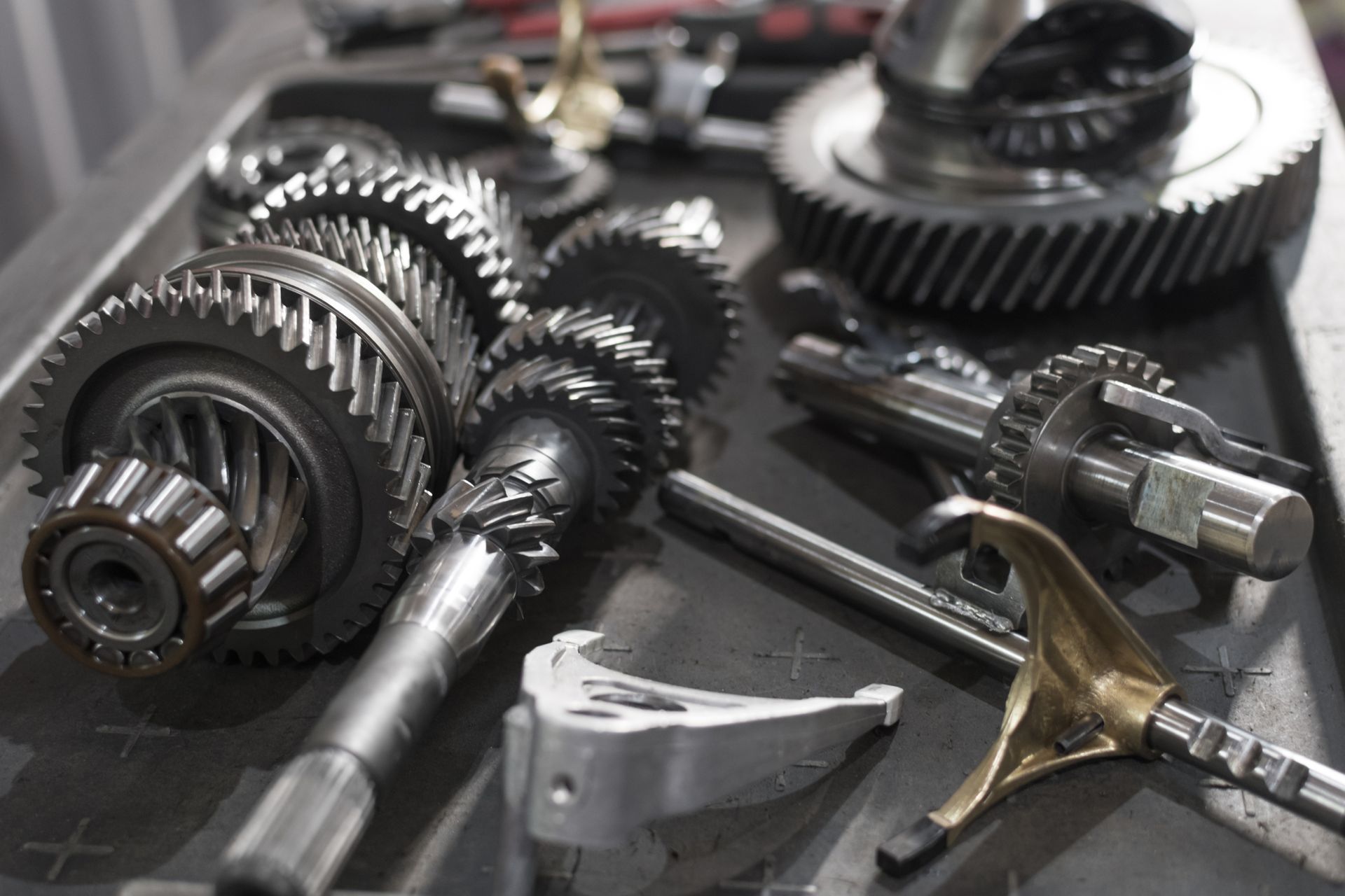 A bunch of gears are laying on a table
