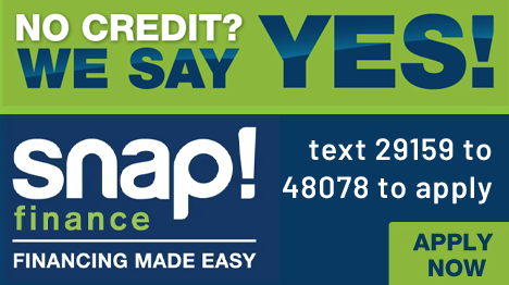 A snap finance sign that says no credit we say yes