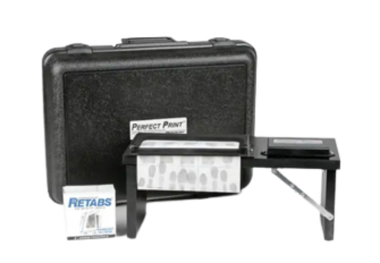 Black fingerprinting kit with case, pad, and ink.