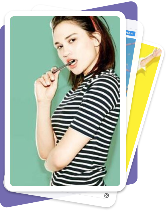 Teenager biting on pen and looking at camera 