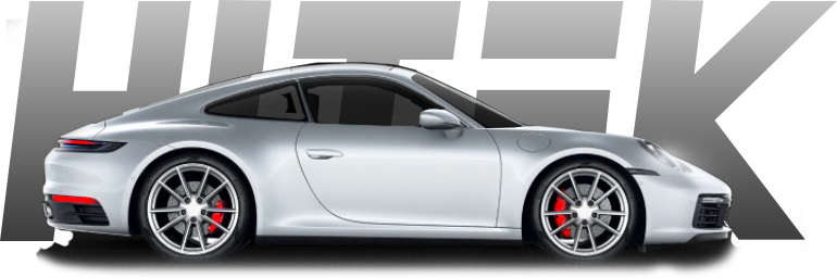 Silver sports car with red brake calipers next to the word
