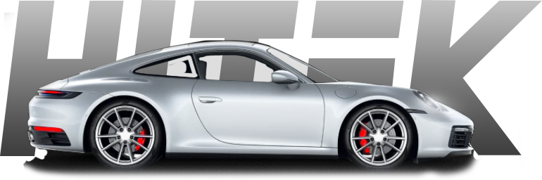 Silver Porsche 911 coupe with red brake calipers, beside gray stylized letters spelling