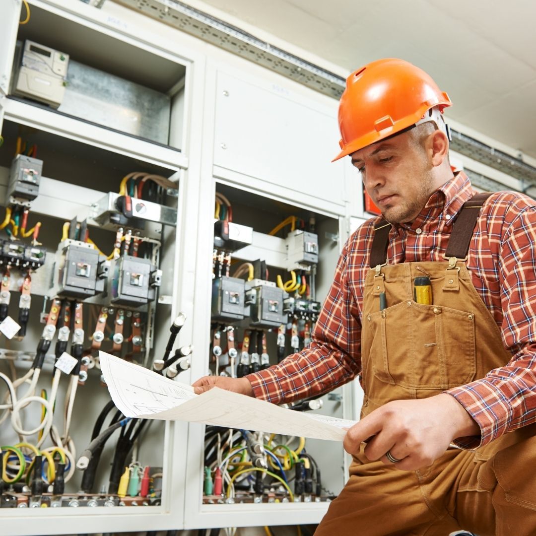 electrician looking at electrical drawing