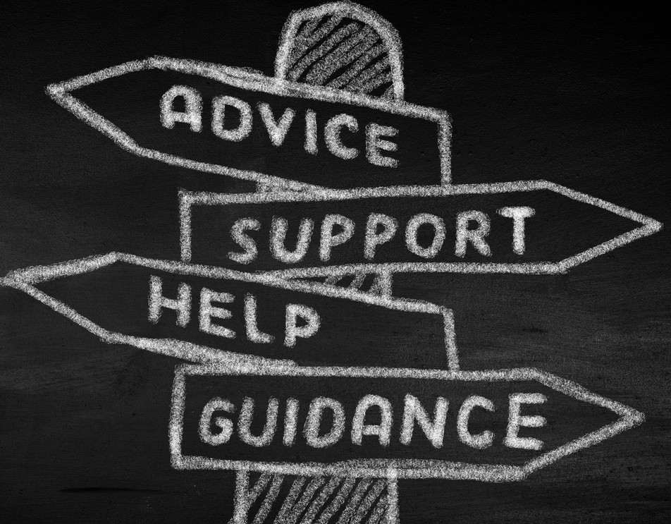 A chalkboard with arrows pointing to advice support help and guidance