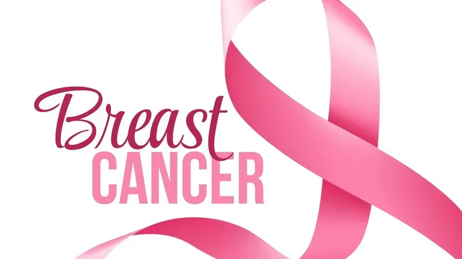 A pink ribbon with the words `` breast cancer '' written on it.