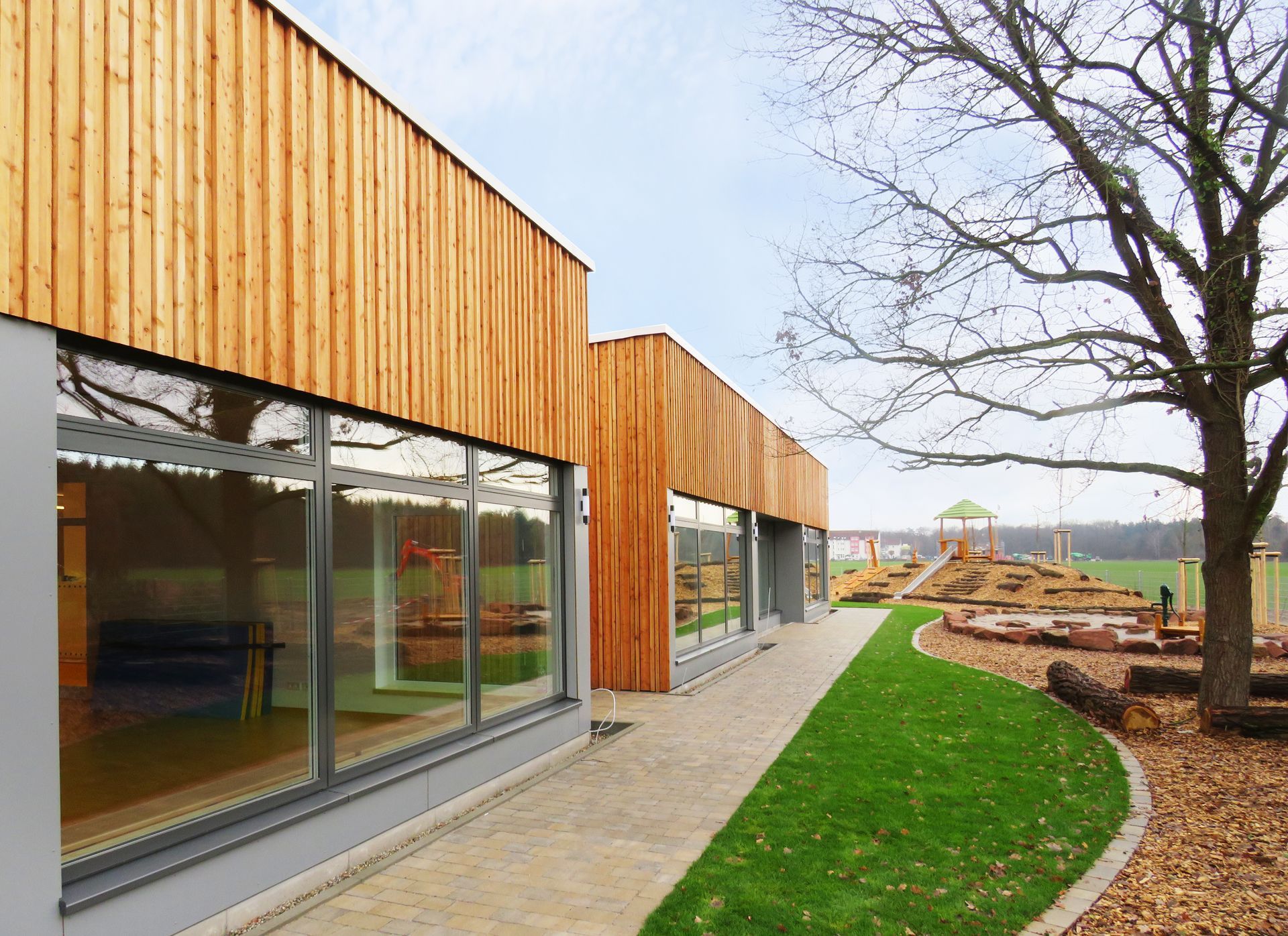 Glasfront Holz Fassade 