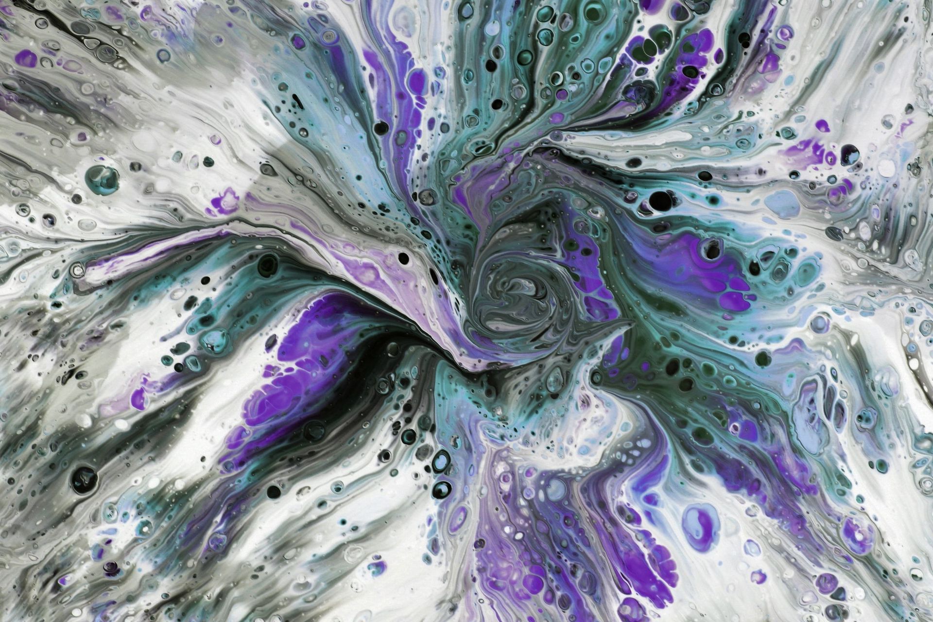 Violet, white and charcoal poured paint swirling into fine cells