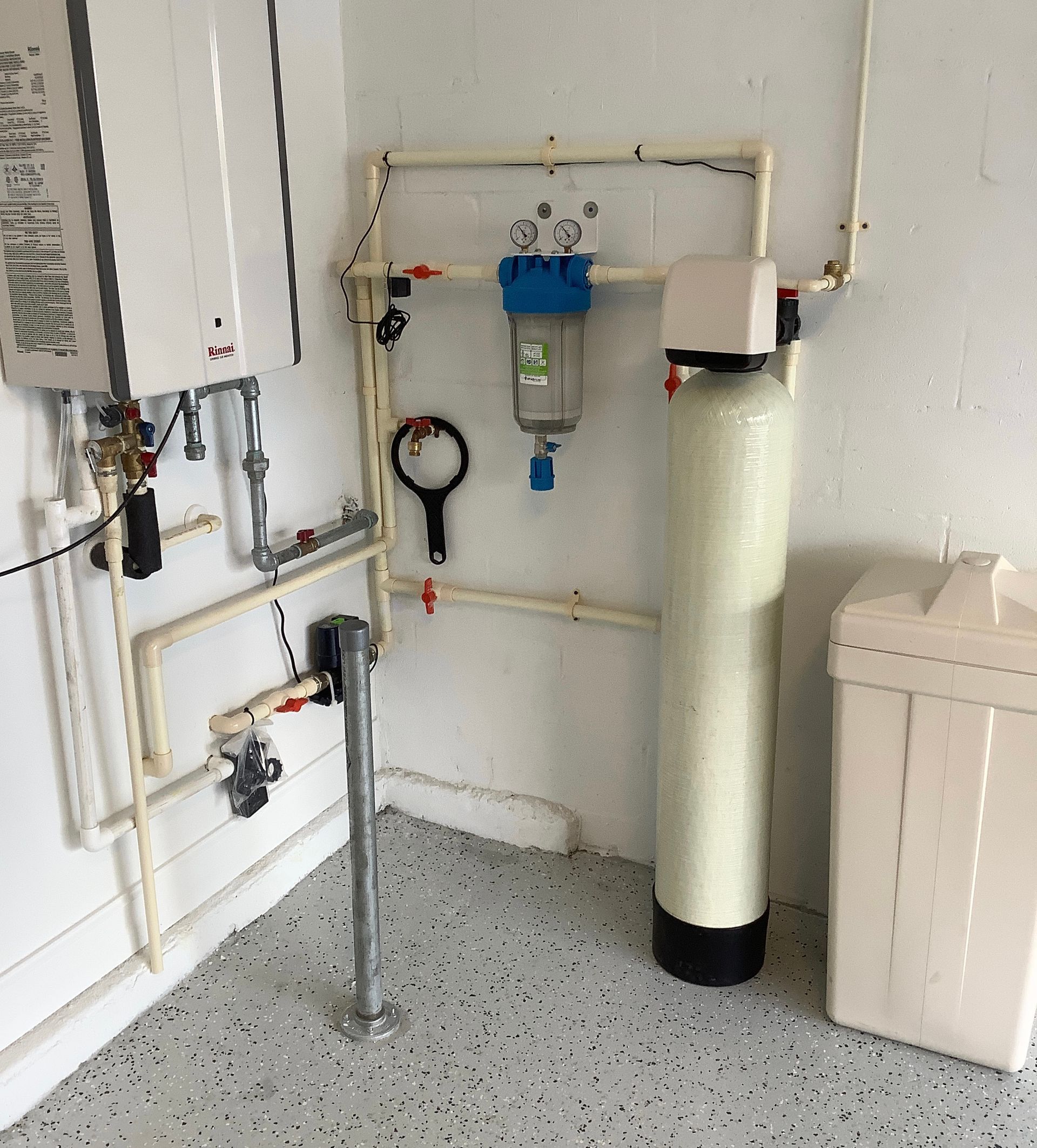 A room with a heater and a water filter