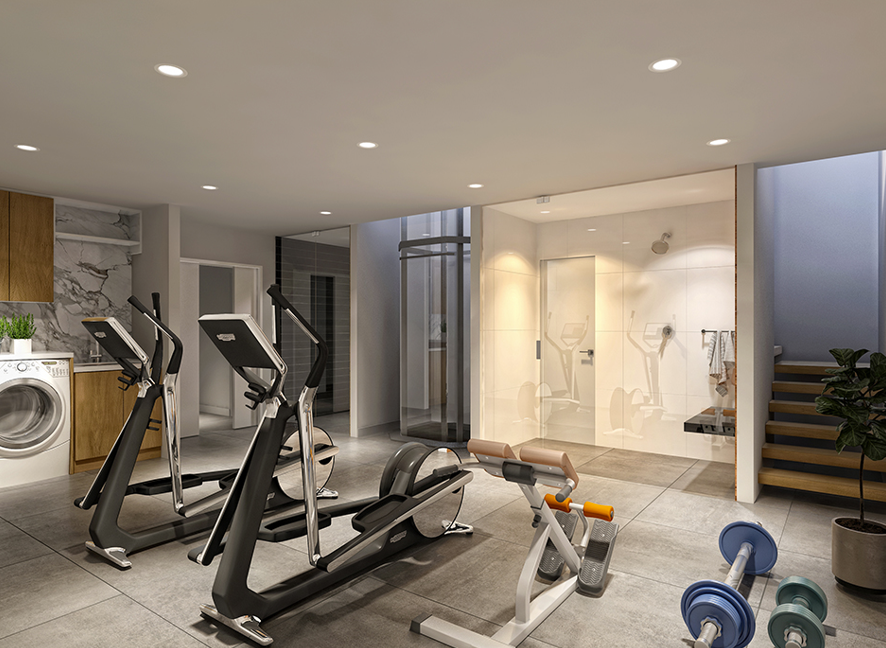 Home gym with elliptical machines, weights, shower, and washing machine.