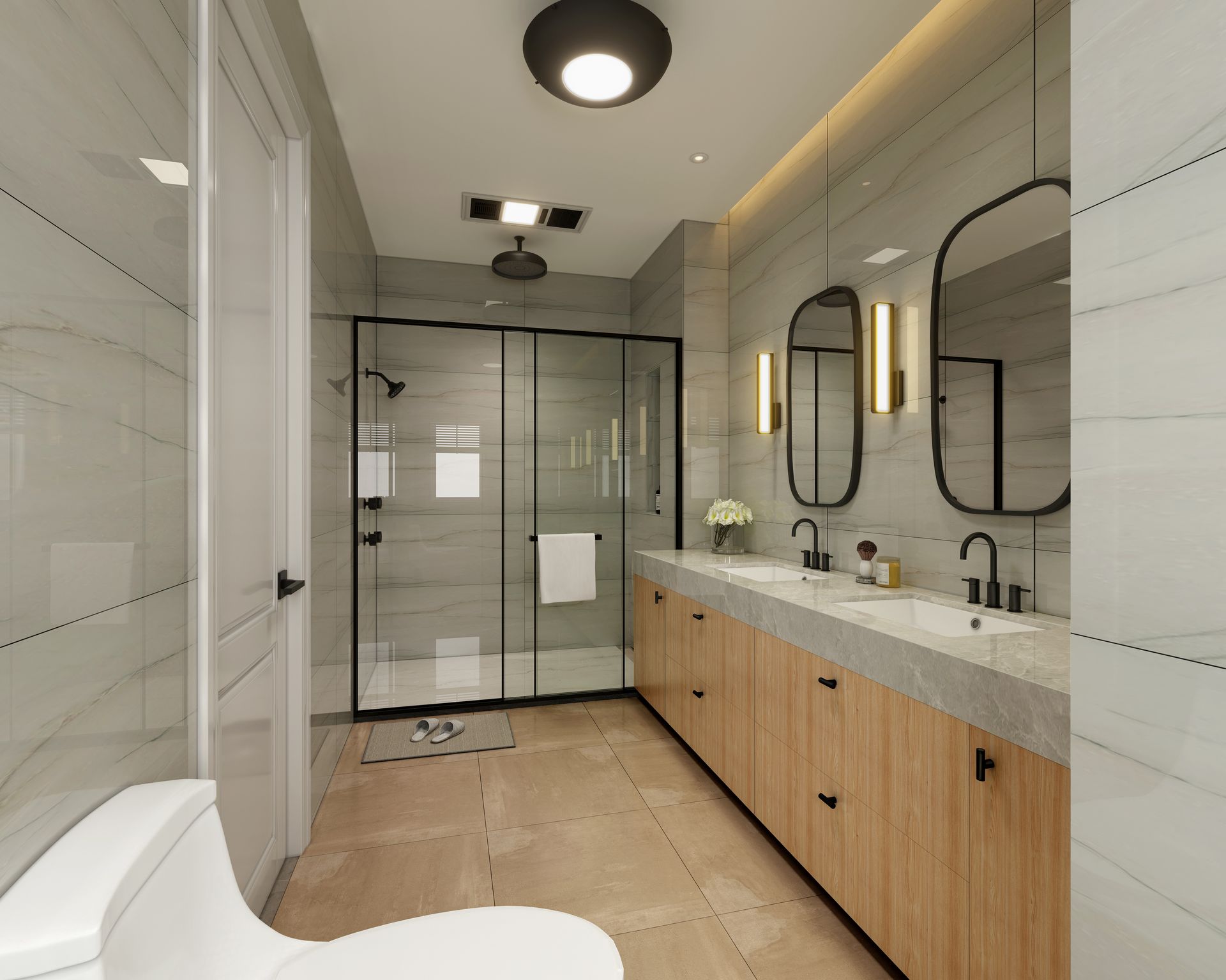 Modern bathroom with a glass shower, double vanity, and a toilet.