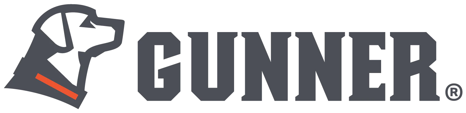 A gunner logo with a dog on it on a white background.