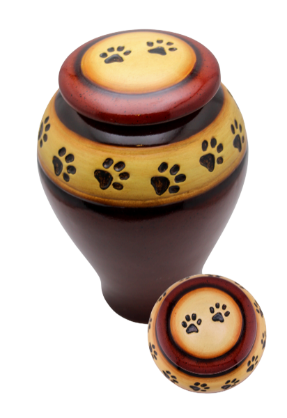 Decorative paw-print urn with gold top and dark brown base, shown with a matching small keepsake urn