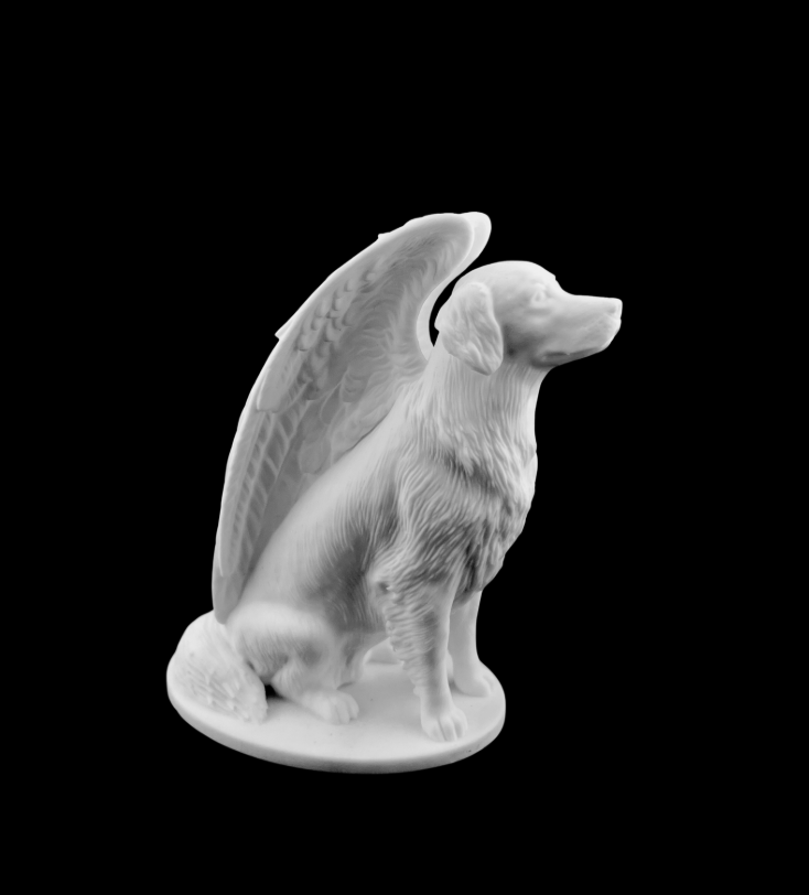 White dog angel figurine with wing, seated on a base against a black background