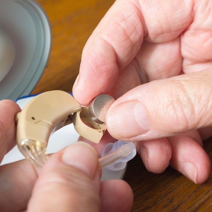 putting hearing aid