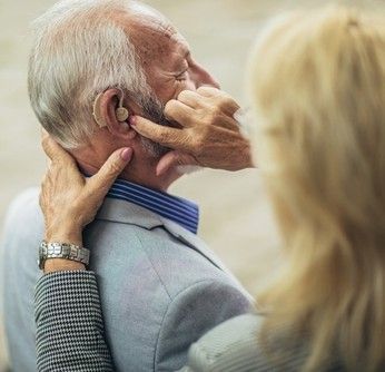 putting hearing aid