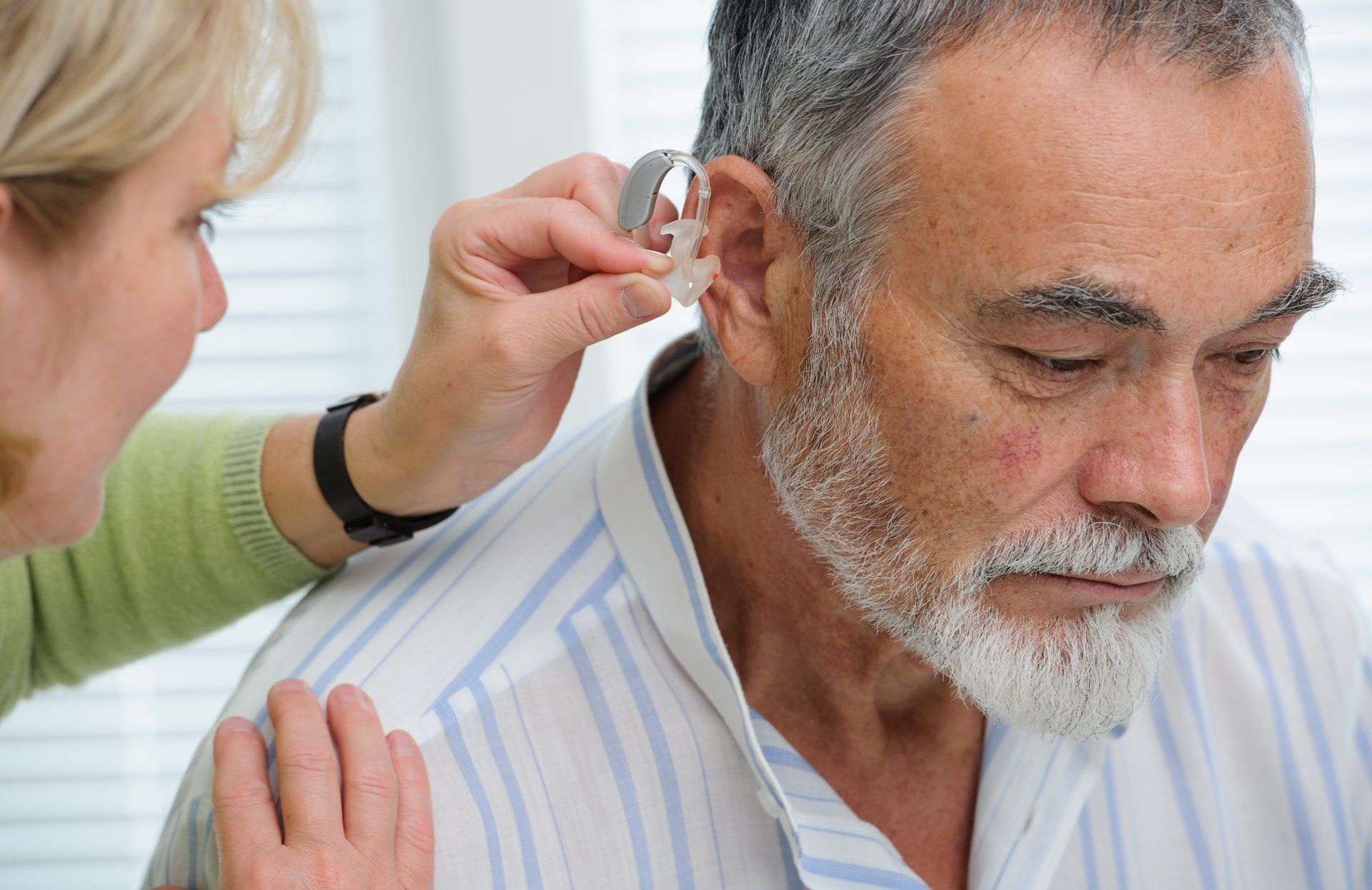 putting hearing aid