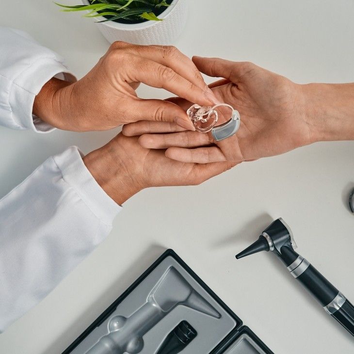 putting hearing aid