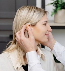 putting hearing aid