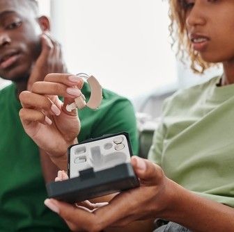 putting hearing aid