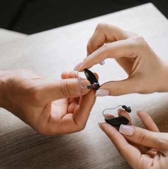 putting hearing aid