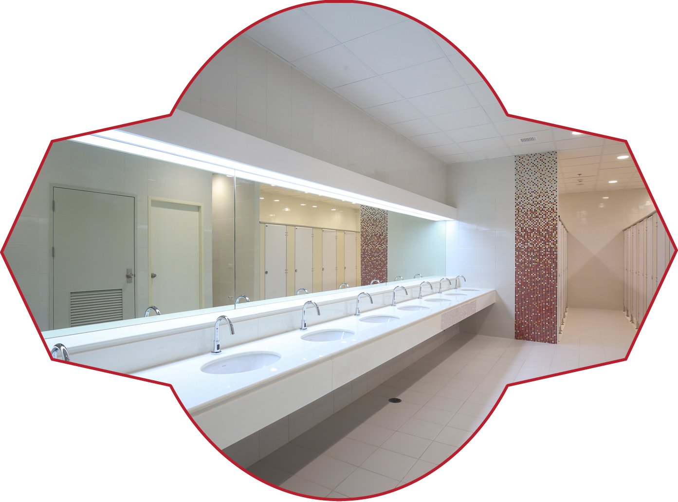 A Bathroom With a Long Sink and a Large Mirror