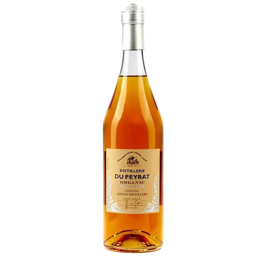 Bottle of Delamain du Peyrat Cognac with a silver cap and tan label. The liquid is amber-colored.