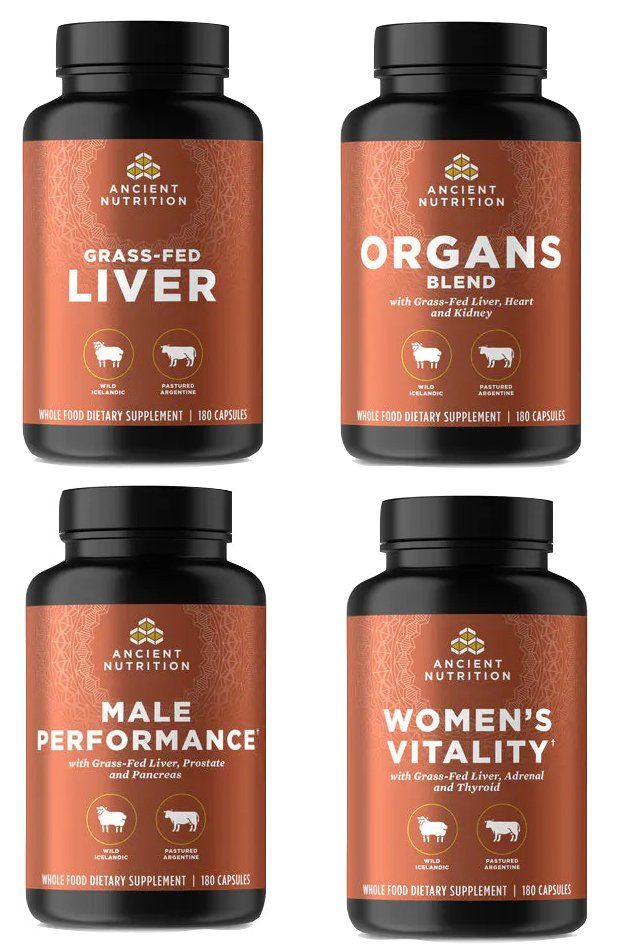 Four brown supplement bottles with black lids, labeled