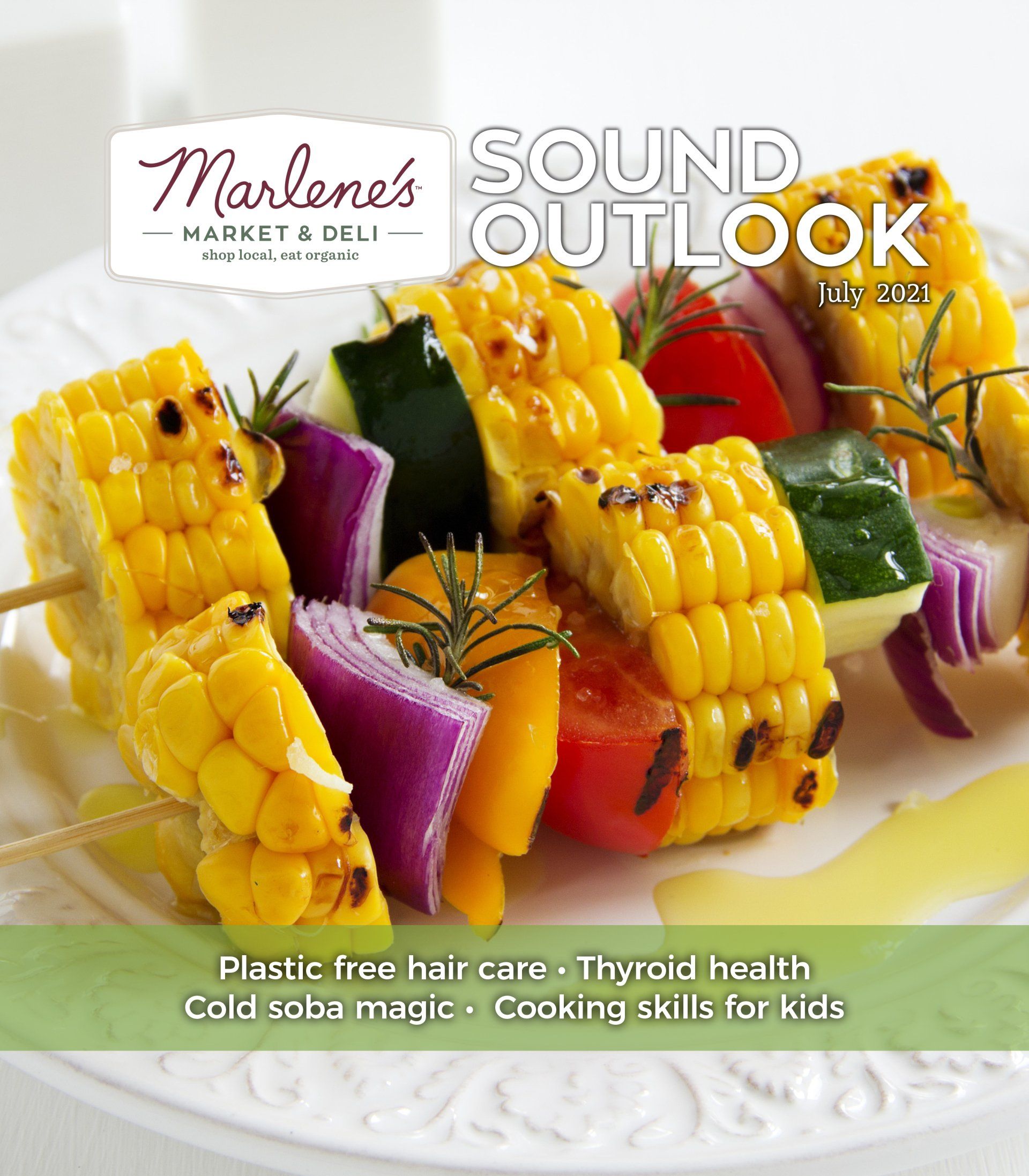 Magazine cover: corn and vegetable skewers with text 