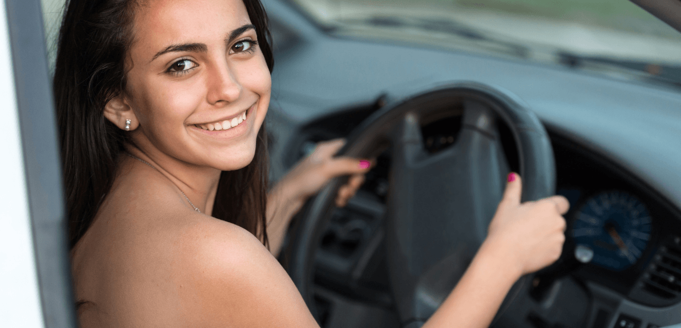 Young girl learning to drive