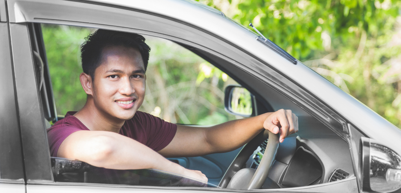 Young man learning to drive