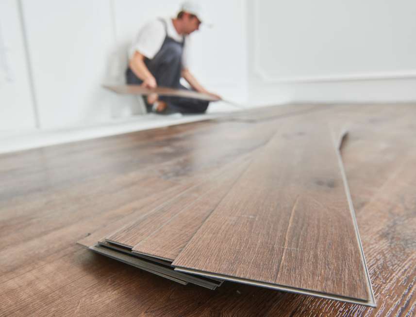 Worker Laying Parquet Flooring