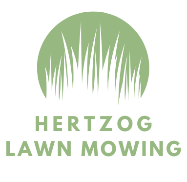 A logo for Hertzog Lawn Mowing Service with a picture of grass in a circle. A logo for Hertzog Lawn Mowing Service with a picture of grass in a circle.