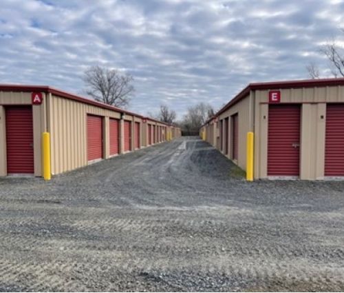 outdoor storage units with red doors for partners self storage