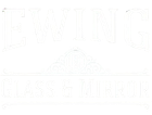 White storefront sign reading “EWING” and “GLASS & MIRROR” with a faint emblem in the center