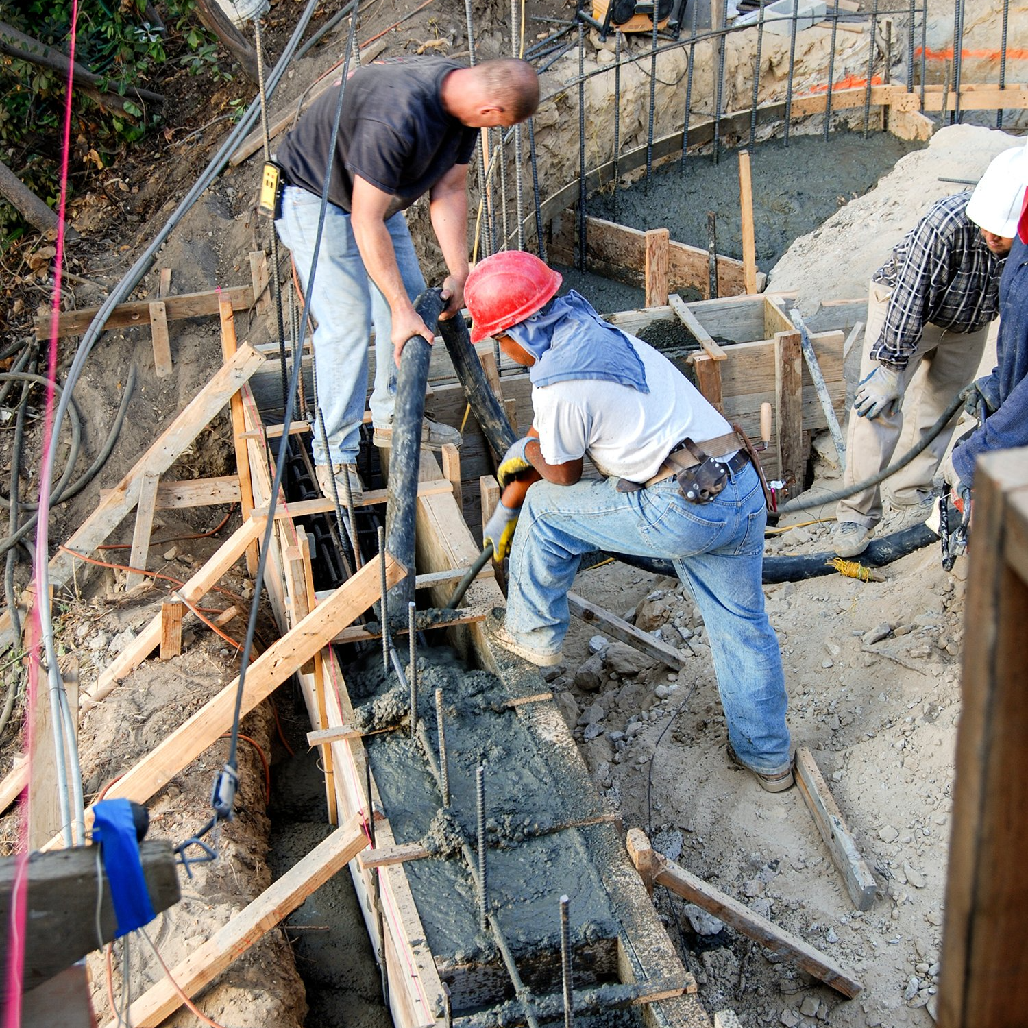 A group of men are working on a construction site
