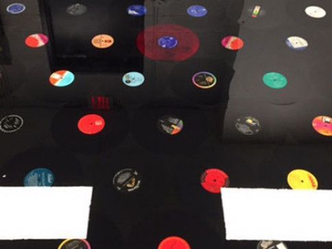 A table with a lot of colorful buttons on it