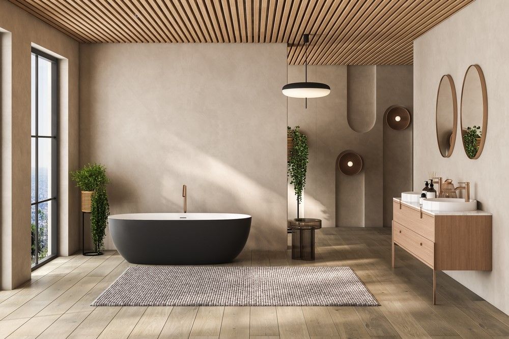 Modern bathroom with a freestanding black tub, floating vanity, mirrors, and warm wood accents