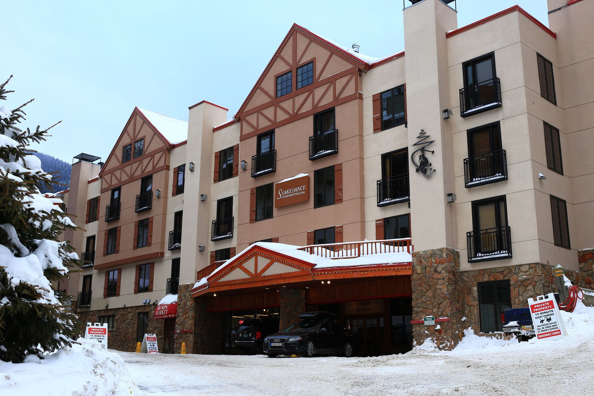A large building with a sign that says no parking