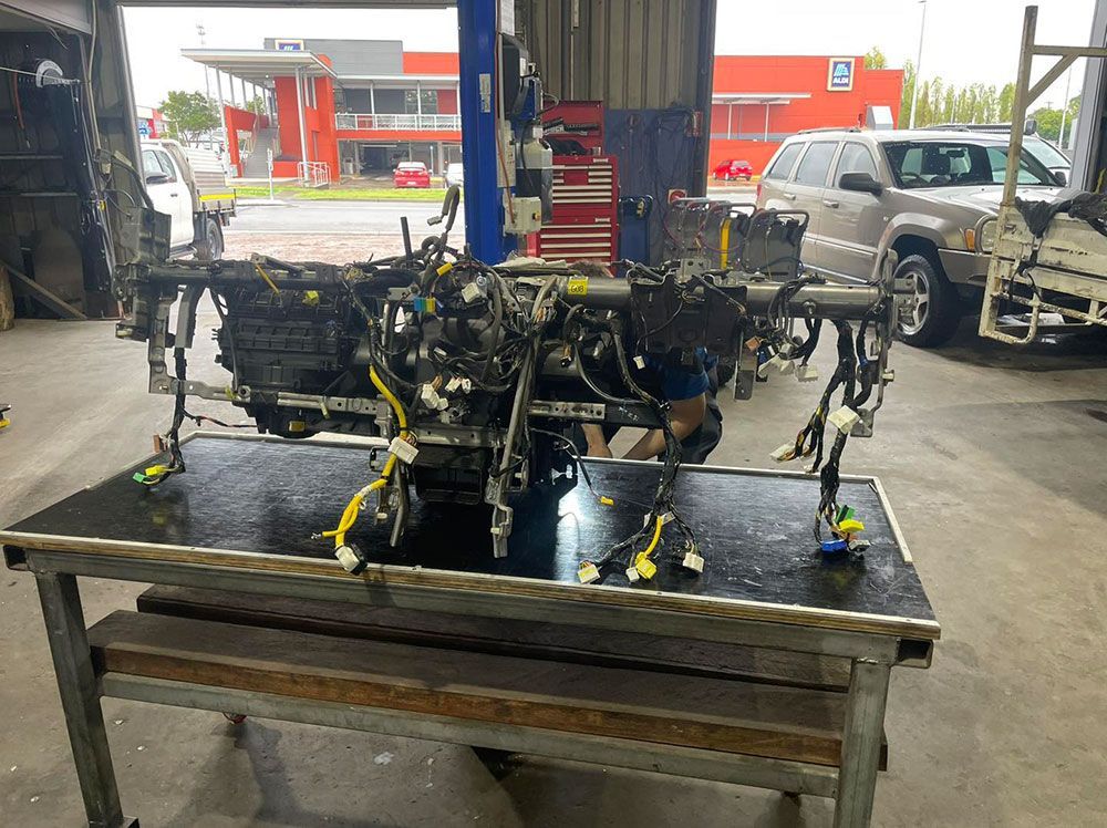 A Car Engine Is Sitting On A Table In The Repair Shop — Autocool Air Conditioning in Raymond Terrace, NSW