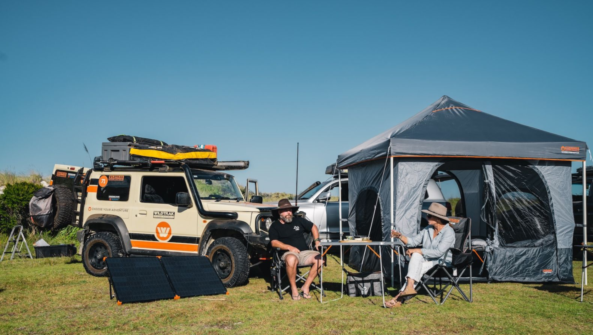 Wildtrak camping setup with solar and off-road vehicle