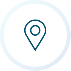 Blue location pin icon within a light blue circle.