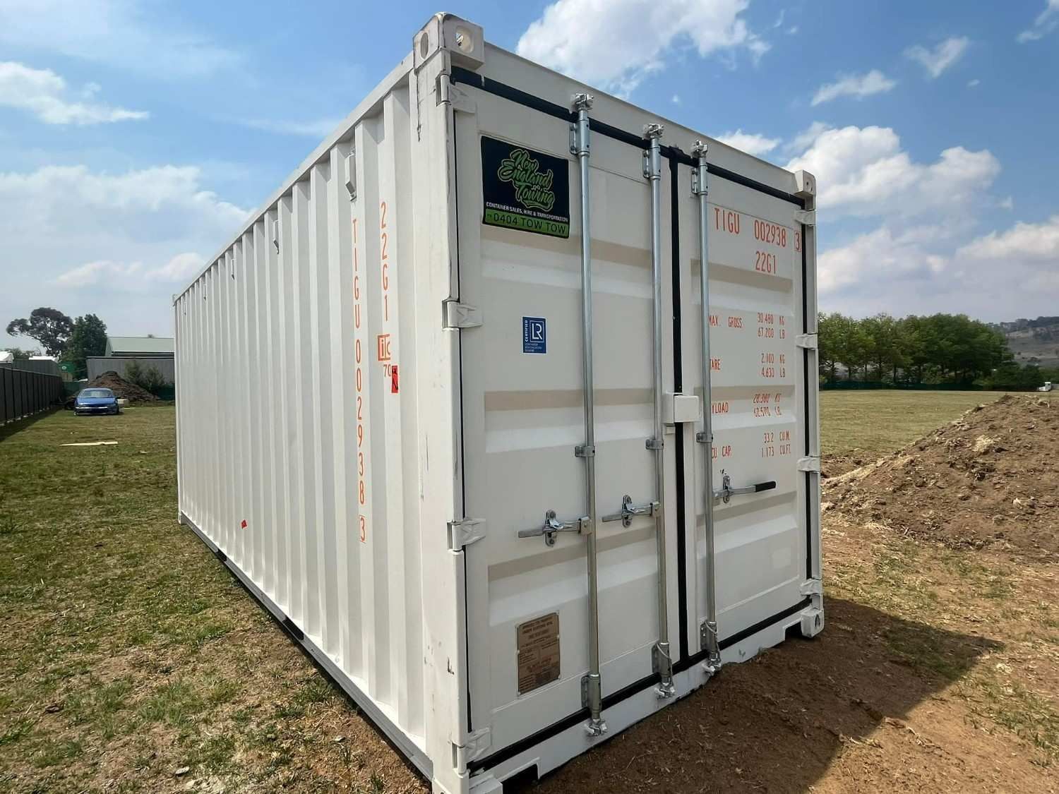 White Shipping Container on A Grassy Field — New England Towing in Warialda, NSW