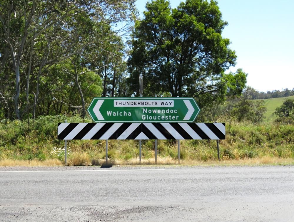 Roadside Sign with Directions to Walcha, Nowendoc, and Gloucester — New England Towing in Walcha, NSW