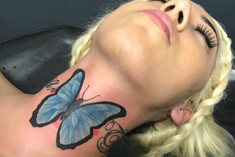 Butterfly Tattoo In Neck