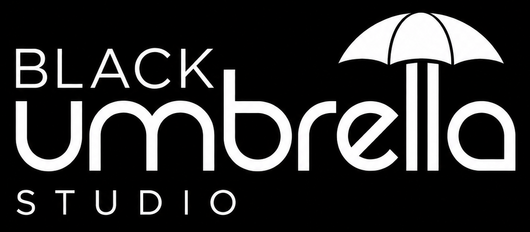 Black Umbrella Studio logo with white text and umbrella icon on black background