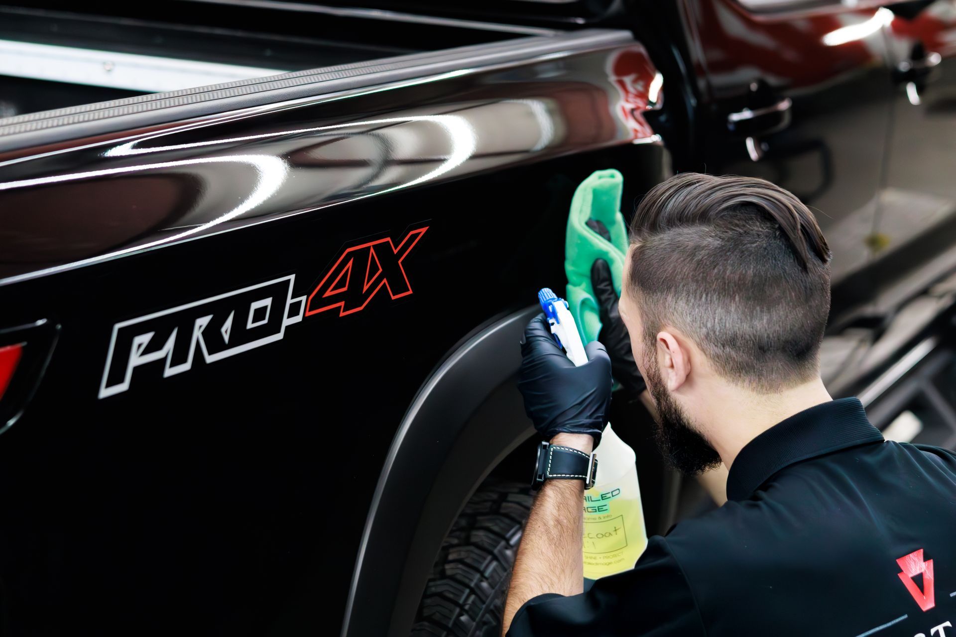 Buffing down ceramic coating on a brand new Nissan Frontier Pro-4X in Erie, PA