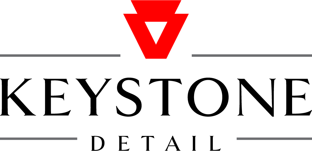 Logo for Keystone Detail, red stylized keystone above "KEYSTONE" and "DETAIL" in black text.