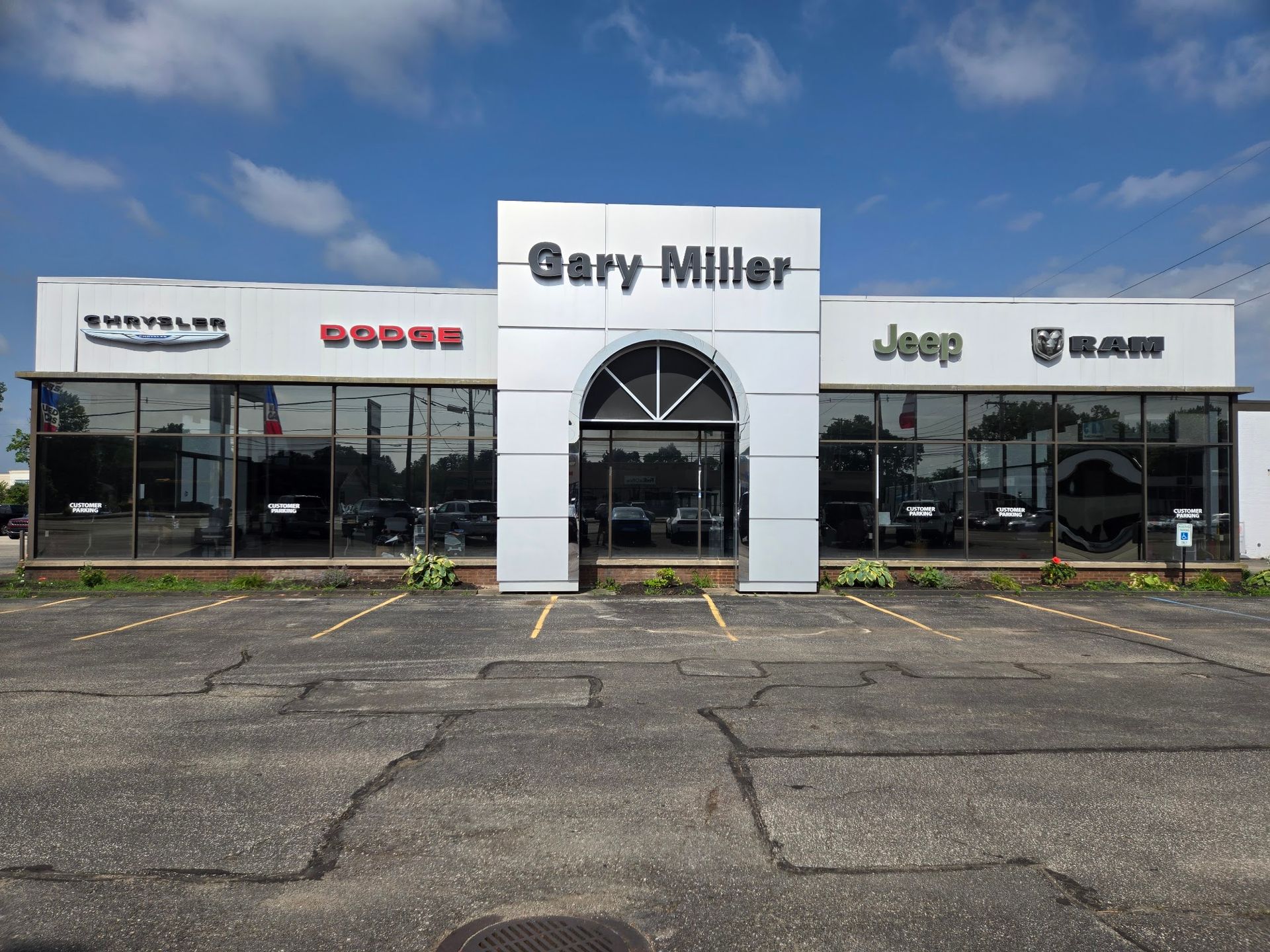 Gary Miller Chrysler Dodge Jeep RAM dealership in Erie, PA after commercial flat glass window tinting by Keystone Detail