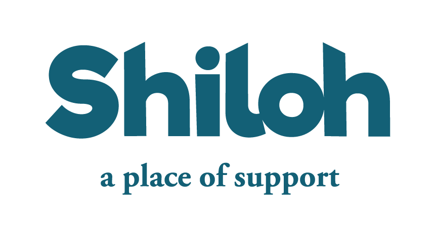 Shiloh logo in teal with the tagline “a place of support” underneath