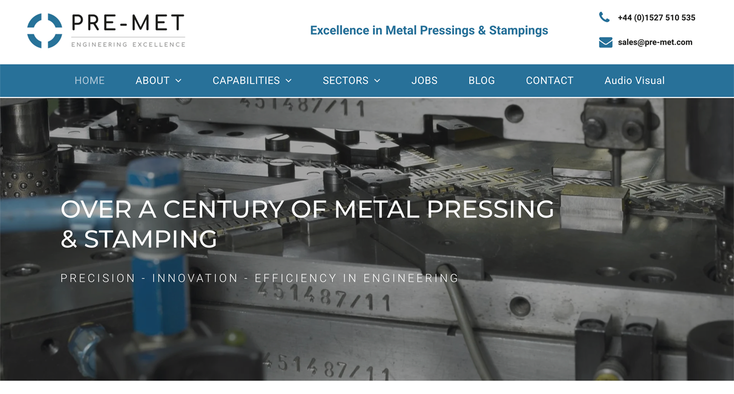 PRE-MET website homepage with industrial metal stamping machine.